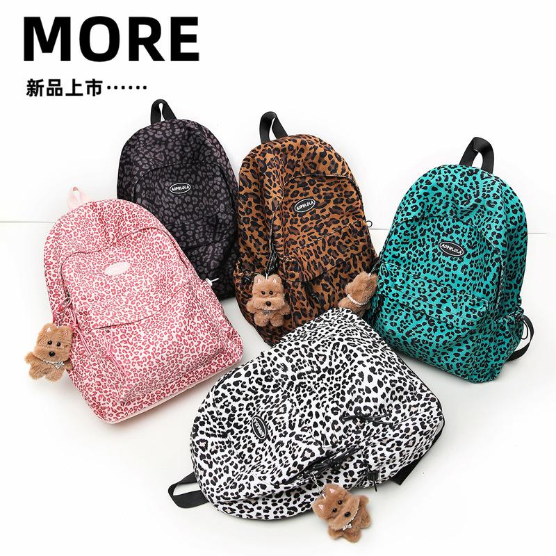 SchoolbagYX high-value leopard print backpack female college student daily commuter backpack high school junior high school large-capacity schoolbag