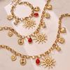 Spiral Sun & Bear Zirconia Multi-Pendant Necklace & Bracelet Set