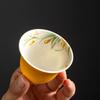 Yellow Glazed Open-Mouth Gongfu Teacup with Hand-Painted Inner Orchid Design
