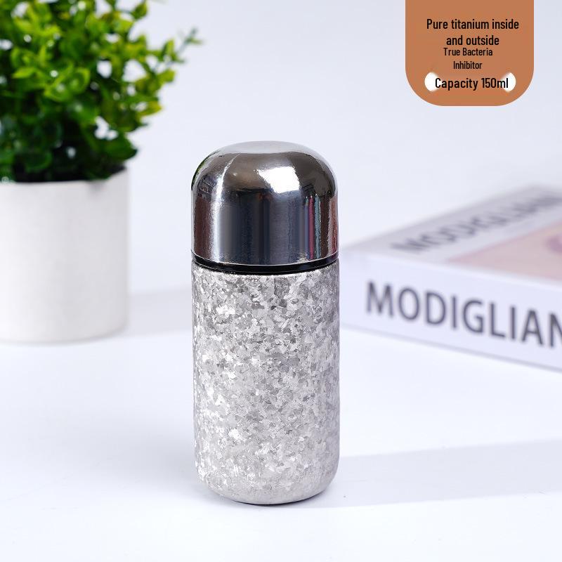 > Sleek Mini Titanium Antibacterial Double-Layer Thermos Cup - Portable, High-Value, Pocket-Sized.