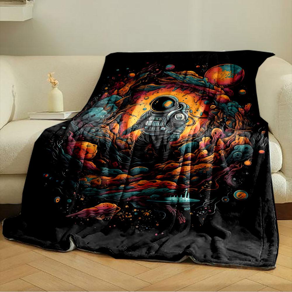 Vibrant space scene with an astronaut surrounded by swirling cosmic forms. for all seasons blanket lunch break throw gift