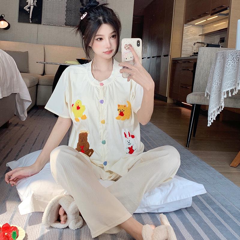 

Three-Piece Women s Summer Pajama Set: Short Sleeve, Shorts, and Cartoon Cardigan in Cloud Cotton with a Round Neck. M-L