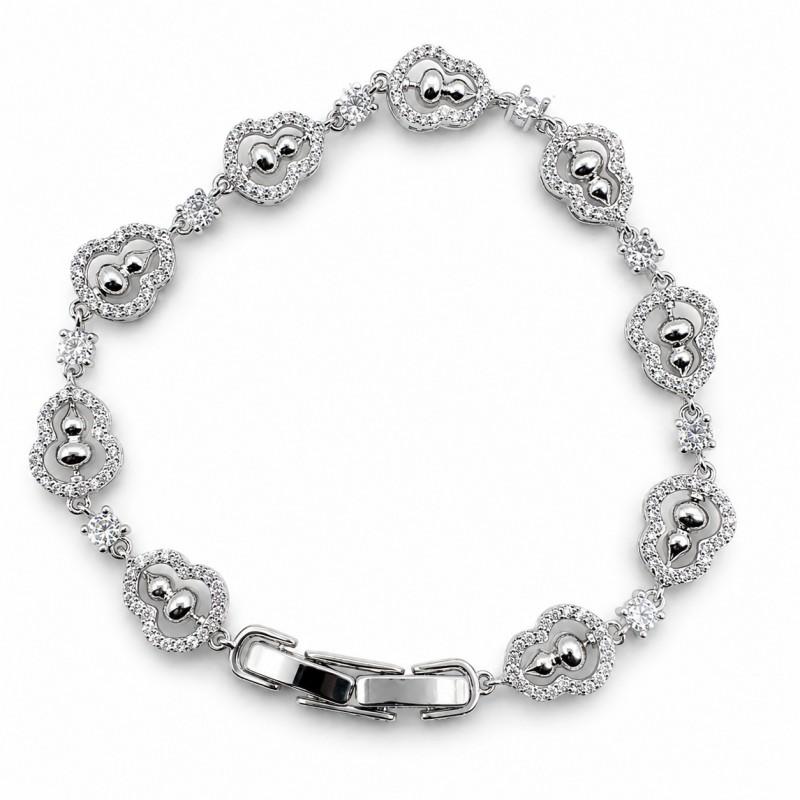 Elegant Hollow Rotating Gourd Charm Bracelet With Sparkling Zirconia Gold Or White Plated Copper Jewelry Couples White Gold-tone Rotating Gourd