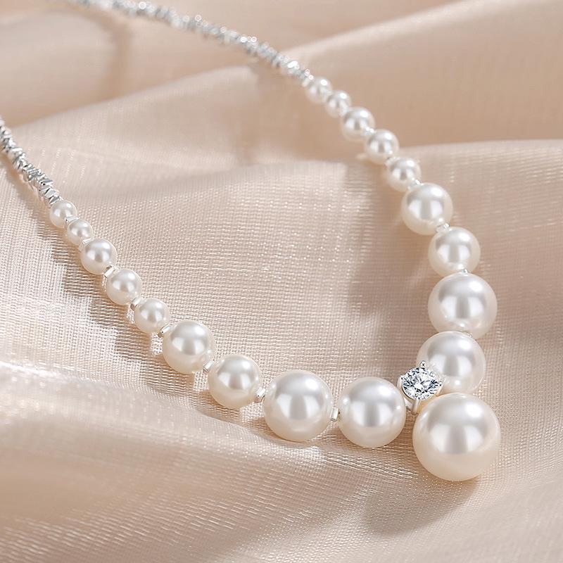 Luxurious S925 Sterling Silver Clavicle Necklace with Crushed Silver and French-Style Round Imitation Pearls.