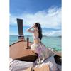 Holiday floral suit women's summer one-word shoulder tube top high-waisted skirt seaside beach two-piece set