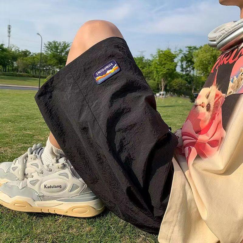 

Men s Summer Thin Breathable Quick-Dry Beach Sport Pants Loose Stylish Versatile Casual Five-Point Trousers 2XL.