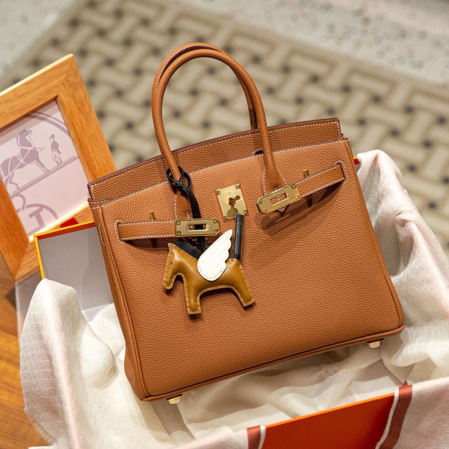 

Сумка-трансформер из коровьей кожи Togo с внутренним швом Safi Thread Platinum с высокой вместимостью 25/30 через плечо 25x14x19cm коричневый