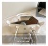 2026 French Light Luxury Cowhide Long Handle Dumpling Baguette Crossbody Bag