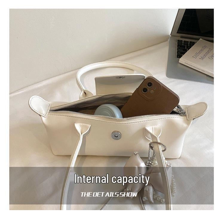 2026 French Light Luxury Cowhide Long Handle Dumpling Baguette Crossbody Bag