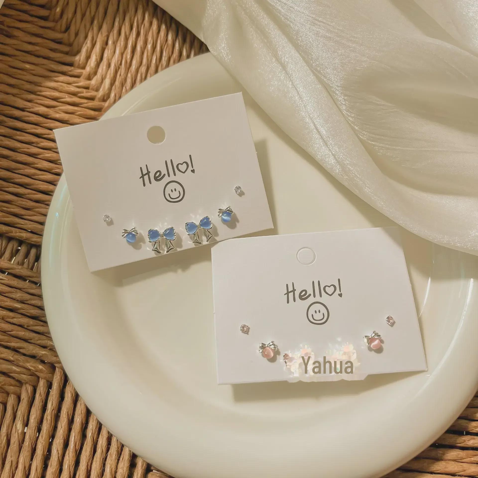 

Silver Needle Blue Cat s Eye Bowknot Earrings: Simple, Versatile, Trendy
