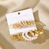 European and American-style, subtly luxurious, fashionable twisted-design earrings with diamond and pearl embellishments11New metal geometric