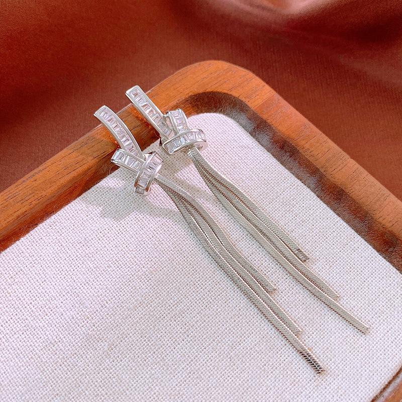 Real gold electroplated silver needle knotted zircon fringed stud earrings Korean fashion temperament earrings light luxury high-end earrings women