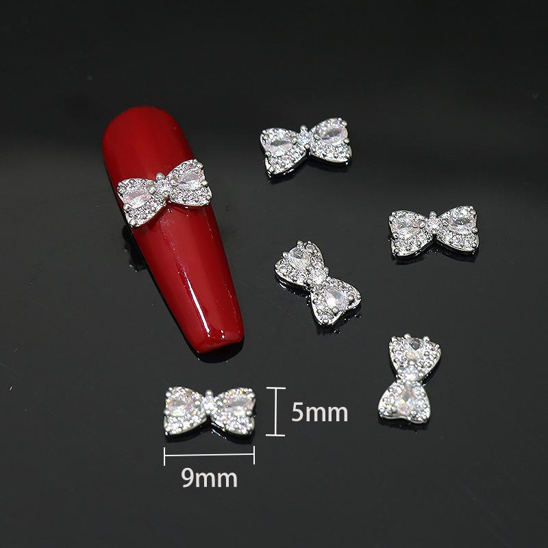 Stříbrná mašlička Zirkonové doplňky na nehty Lesklé diamantové ozdoby na nehty Acc