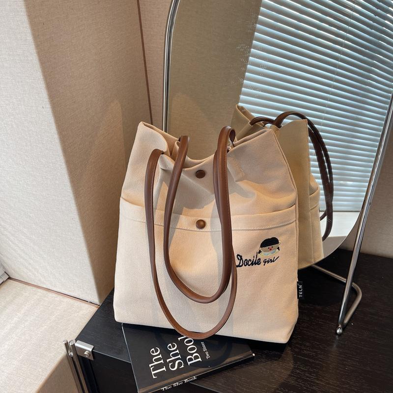Casual versatile canvas bag women's new light commuter shoulder bag large capacity tote bag