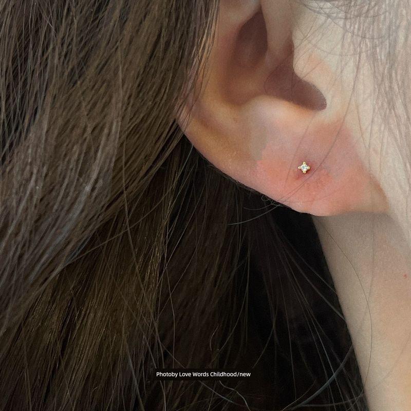 

Women s Mini Japanese-Style Zircon Sterling Silver Stud Earrings Gold pair with sterling silver earplugs