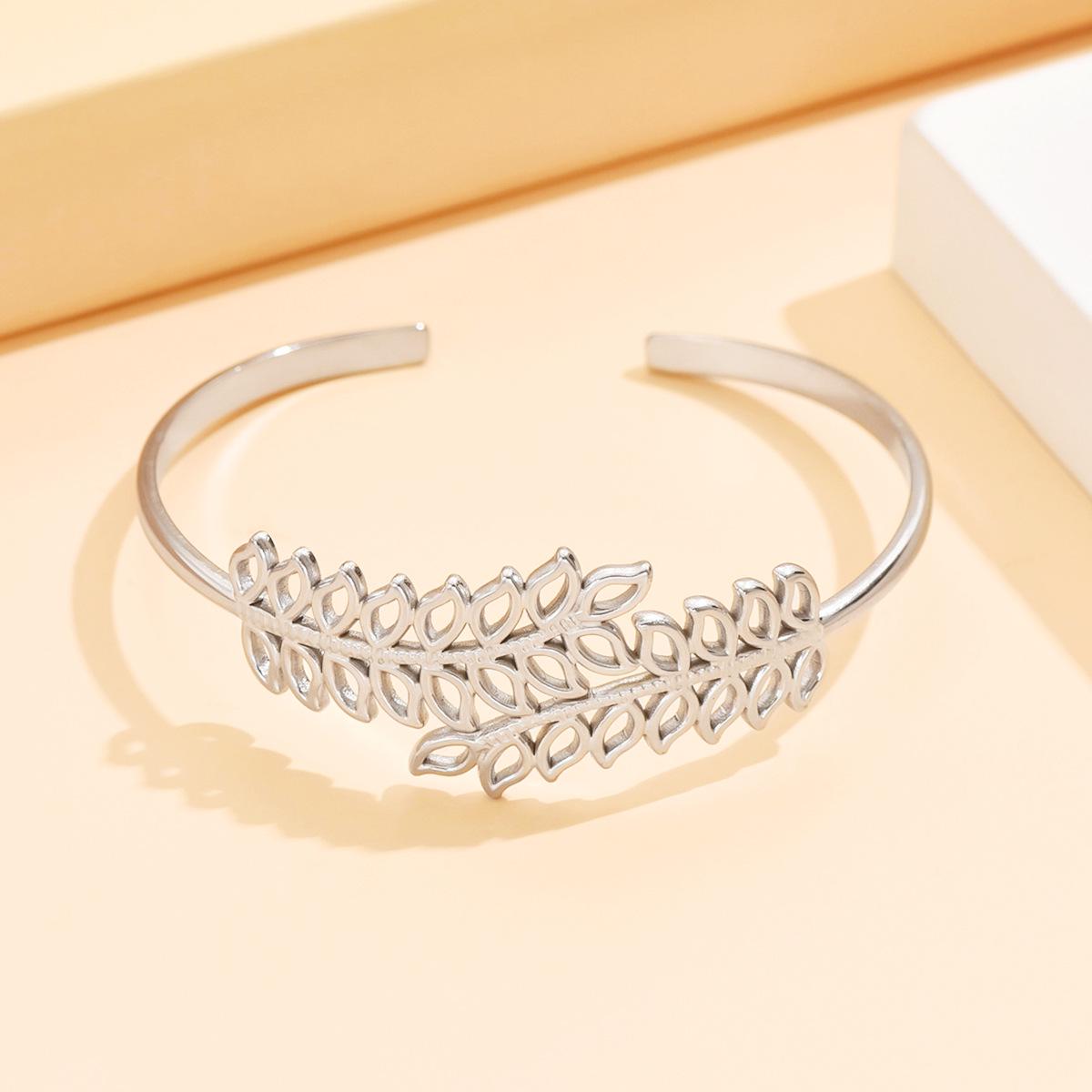 Elegant Hollowed-out Leaf Stainless Steel C-shaped Open Bangle Bracelet for Women