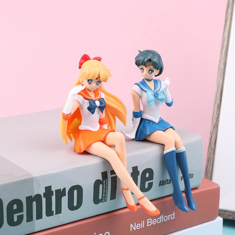 12CM Anime Sailor Moon Action Figure Beautiful Girl Water Ice Moon Pluto Yellow Hair Kawaii Sitting Collectible Model Toy