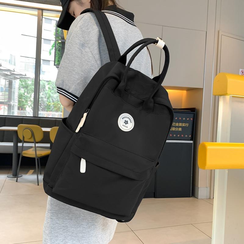 Japanese Ins Girl Backpack Korean Version of Junior High School Student Schoolbag Female Tide Large Capacity Solid Color Nylon Handbag