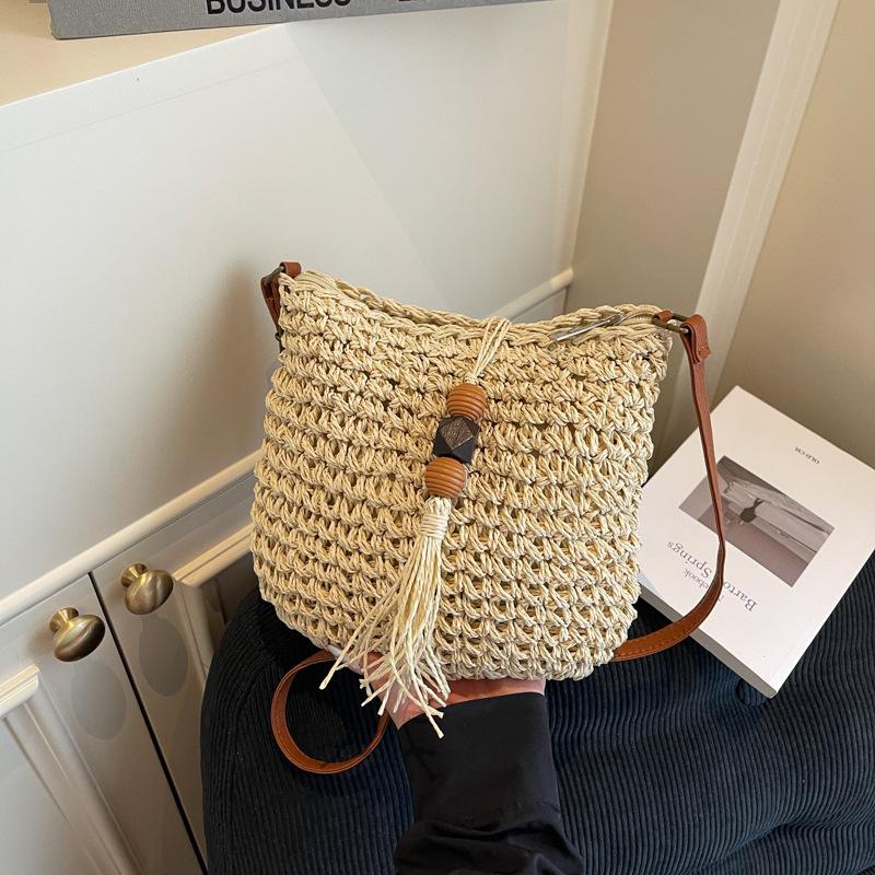 

Popular bucket bag women s summer new woven messenger bag travel beach bag shoulder straw small bag