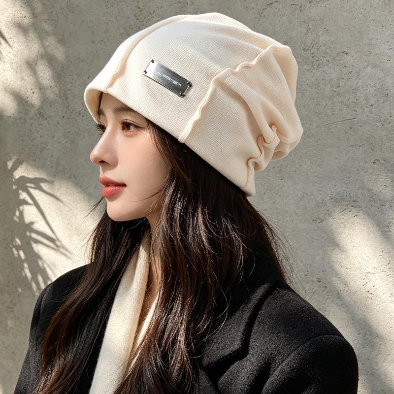 Street niche ins show face small plain pile hat spring and autumn versatile temperament fashion bag head knitted cold hat