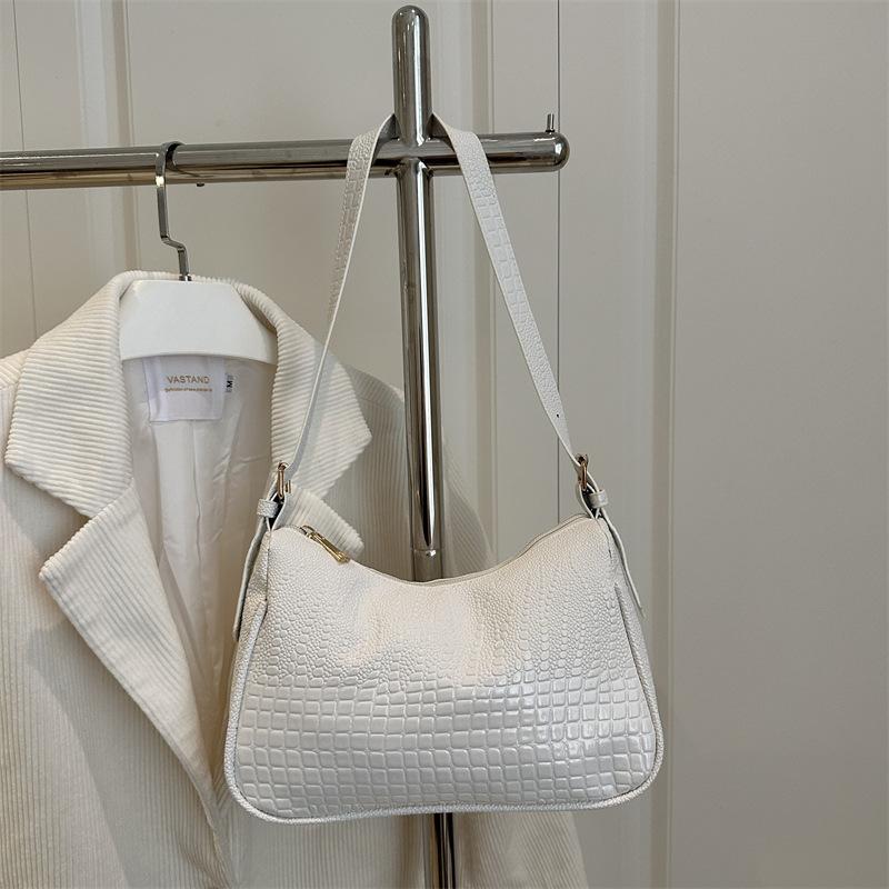 

New stone pattern niche design glossy shoulder bag simple versatile leisure commuter bag bag белый