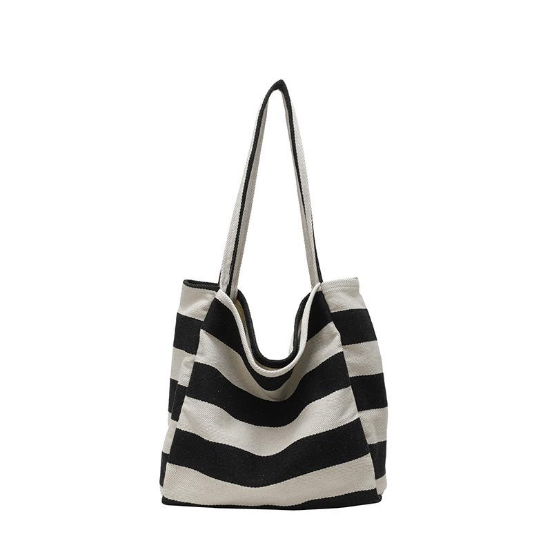 Travel bag canvas bag office worker commuter women large capacity Korean version striped fashion shoulder bag canvas bag shopping