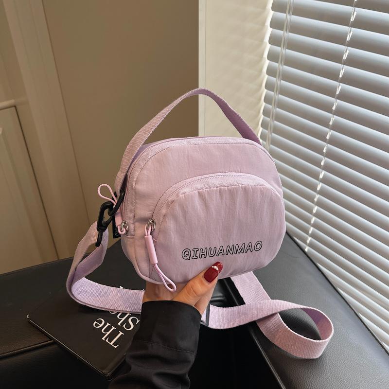 Internet celebrity texture small bag women's bag new 2025 summer foreign style canvas bag women's mini versatile shoulder crossbody bag