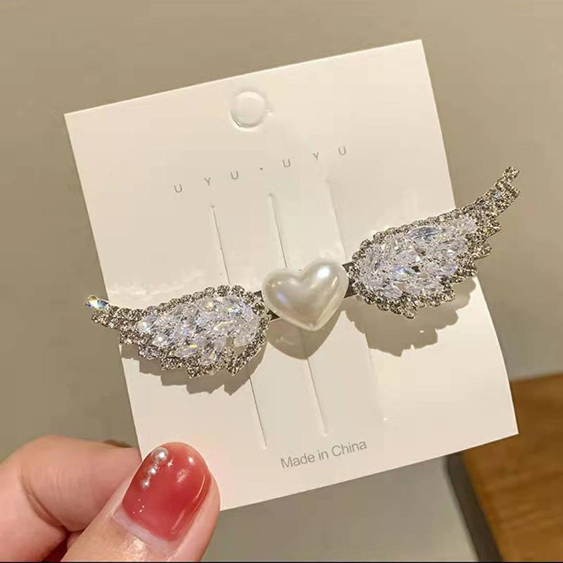 

Корейская заколка для волос «Крылья ангела» со стразами и жемчугом - Модный аксессуар для женщин серебряный