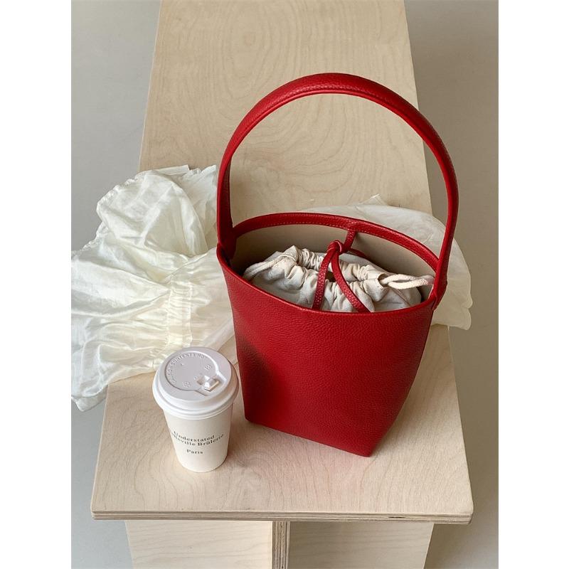 

Cylinder underarm bag women s large-capacity high-end portable shoulder bag simple leather mother bucket bag women красный