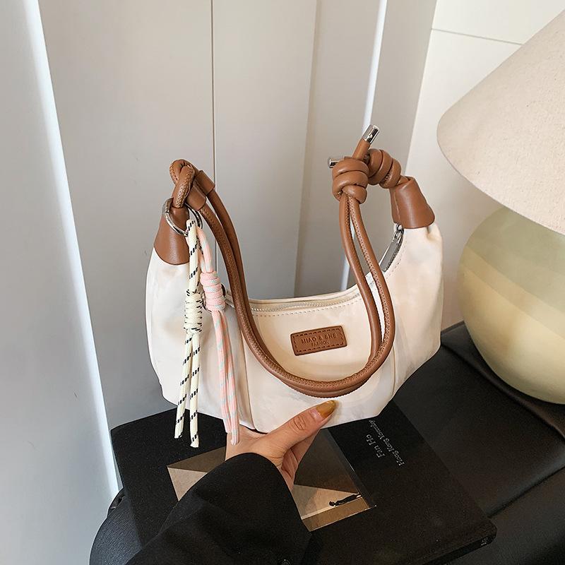 

Сегодняшняя популярная сумка-пельмень женская летняя новая повседневная универсальная сумка на плечо модная сумка-мессенджер для通勤