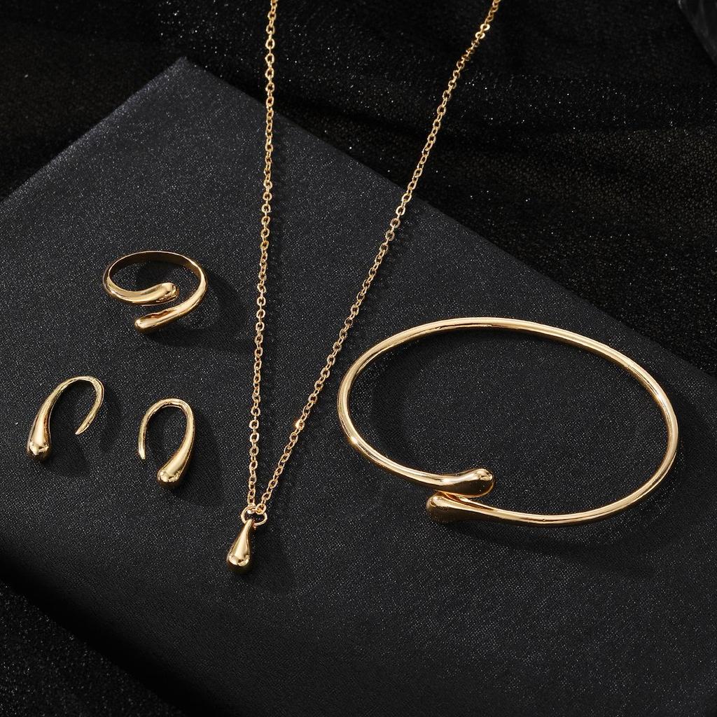 Elegant Personalized 4-Piece Jewelry Set: Necklace, Bracelet, Water Drop Earrings & Ear Clips for Women