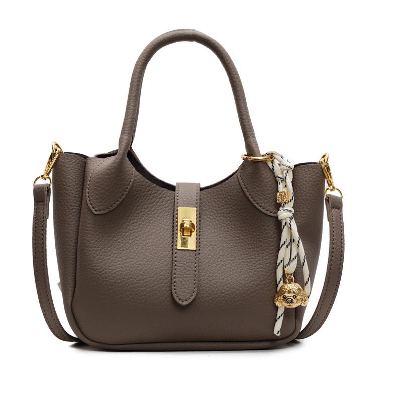 

Корейская версия трендовая темпераментная легкая роскошь узор личи портативная сумка-ведро женская для работы простая с чувством продвинутости сумка-мессенджер сумка