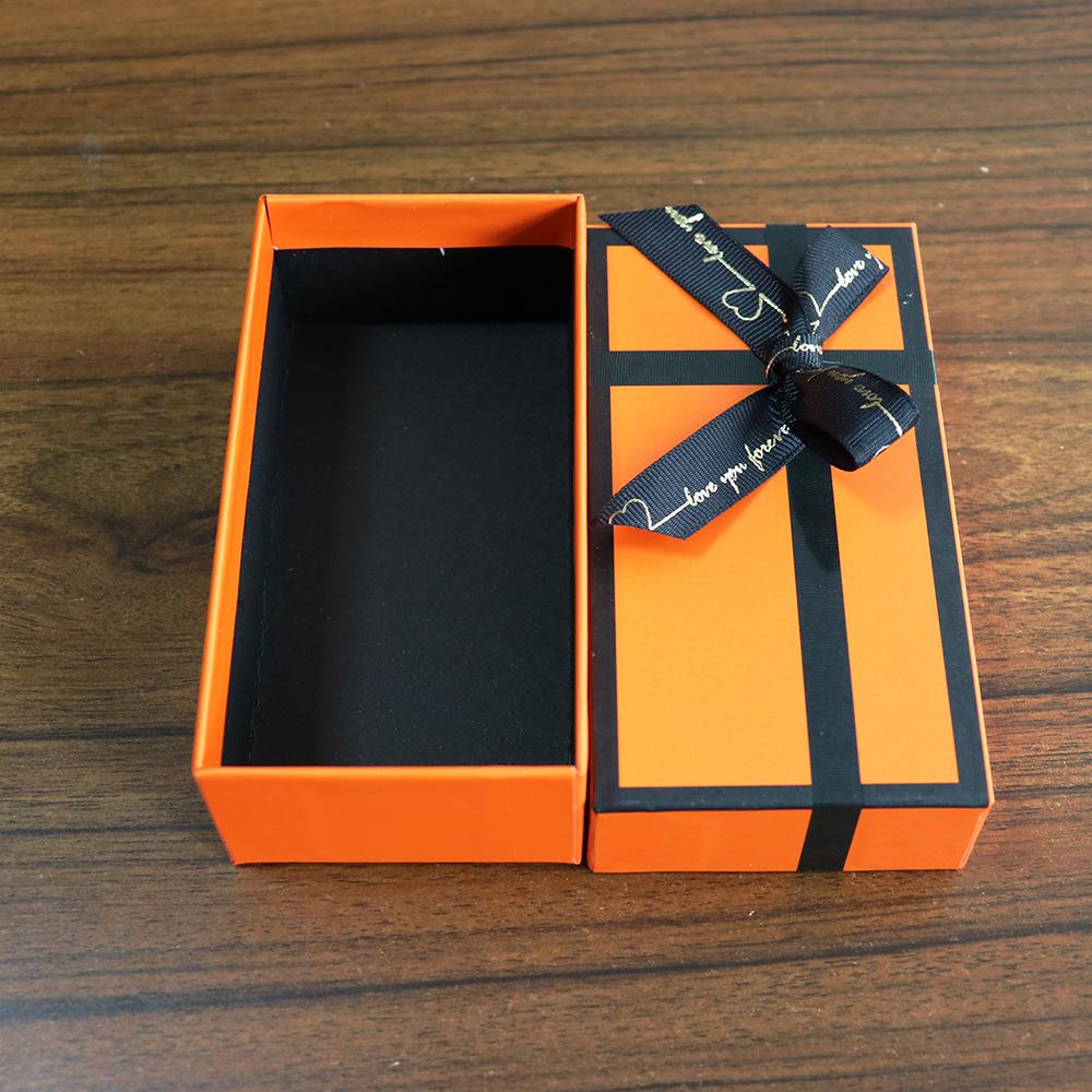 

Роскошная подарочная коробка - Маленький оранжевый брелок/коробочка для помады с бантом 13x7x4.5 cm