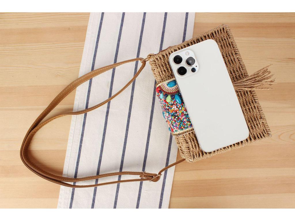 Minimalistisk vävd crossbody-väska i pappersrep för semester vid havet