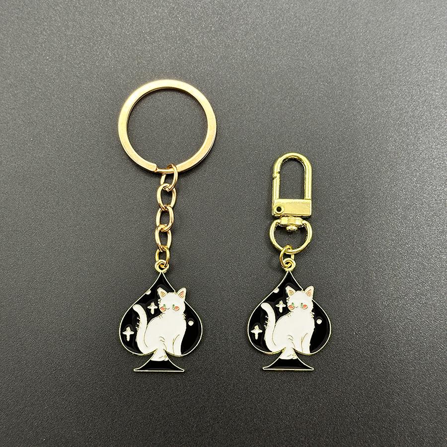 Cartoon Cat Playing Card Keychain with Heart and Geometric Pendant