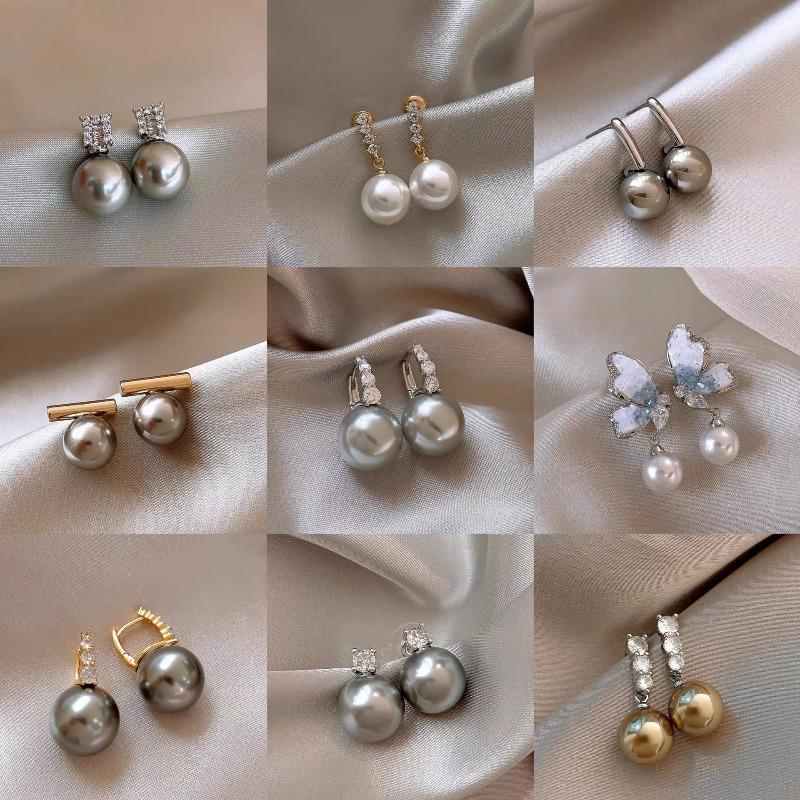 Silver needle zircon butterfly pearl earrings niche design light luxury stud earrings French high-end retro earrings wholesale
