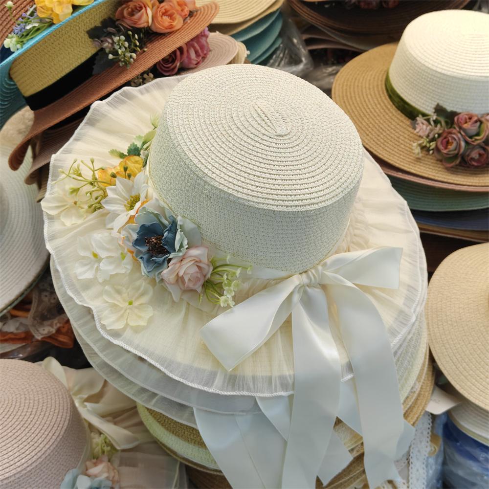 2025 new style flower decoration fresh ladies summer straw hat flat top large brim sun hat beach French elegant wedding hat