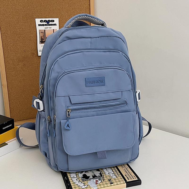 Korean version of simple backpack large capacity junior high school male and female students campus schoolbag backpack light