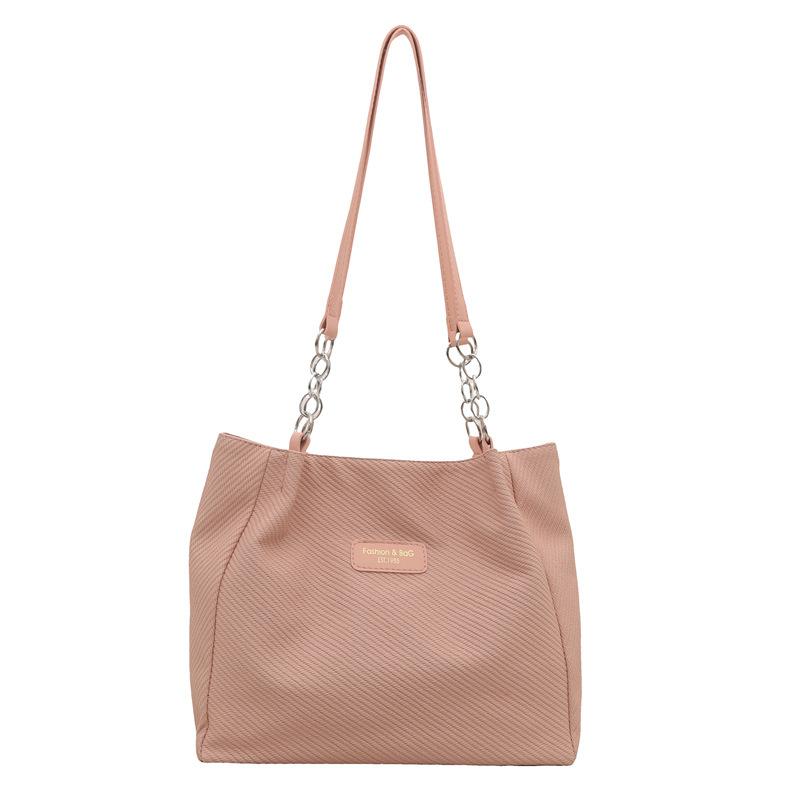 

Сумка женская 2025 Осень Новая Корейская версия Студенческий класс Простая мода Сумка через плечо Большая вместимость Сумка-тоут для поездок на работу single package розовый