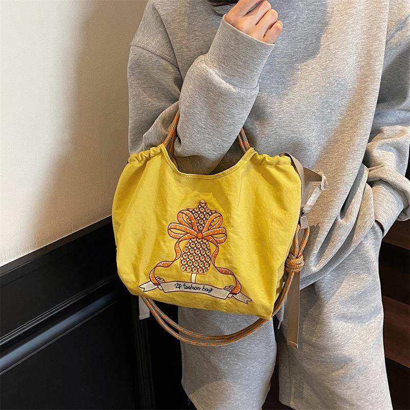 Niche shopping bag Embroidery flower portable small satchel bag Lightweight shopping messenger bag Mobile phone bag Women's fashion shoulder bag