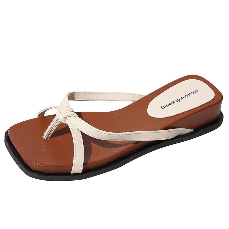 2025 summer new slope heel toe slippers women's holiday style red leisure lazy people wear one word beach sandals