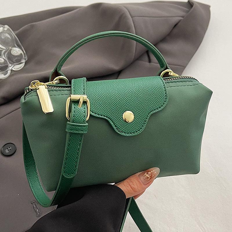 Wholesale new products niche simple contrasting color portable small bag women's leisure trendy versatile light splicing messenger change bag