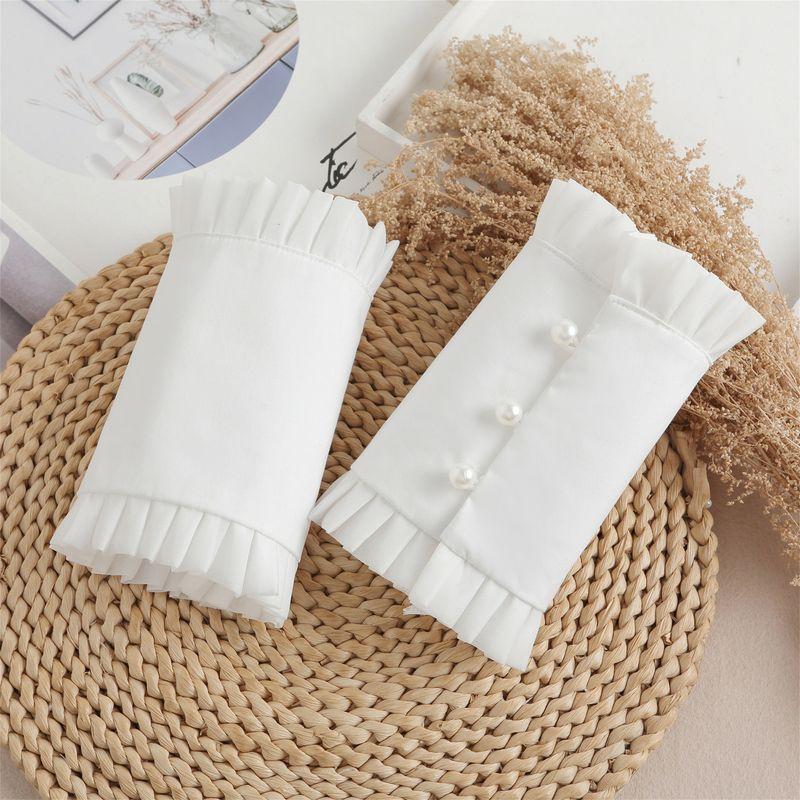 

Стиль дворца Ретро Артистичный Плиссированный край Нарукавник Лолита Белая жемчужина Пряжка Искусственные нарукавники Защита от загрязнений Короткая манжета White