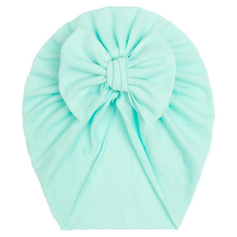 New autumn children's solid color imitation cotton hat, baby comfortable bow pullover hat, baby hat