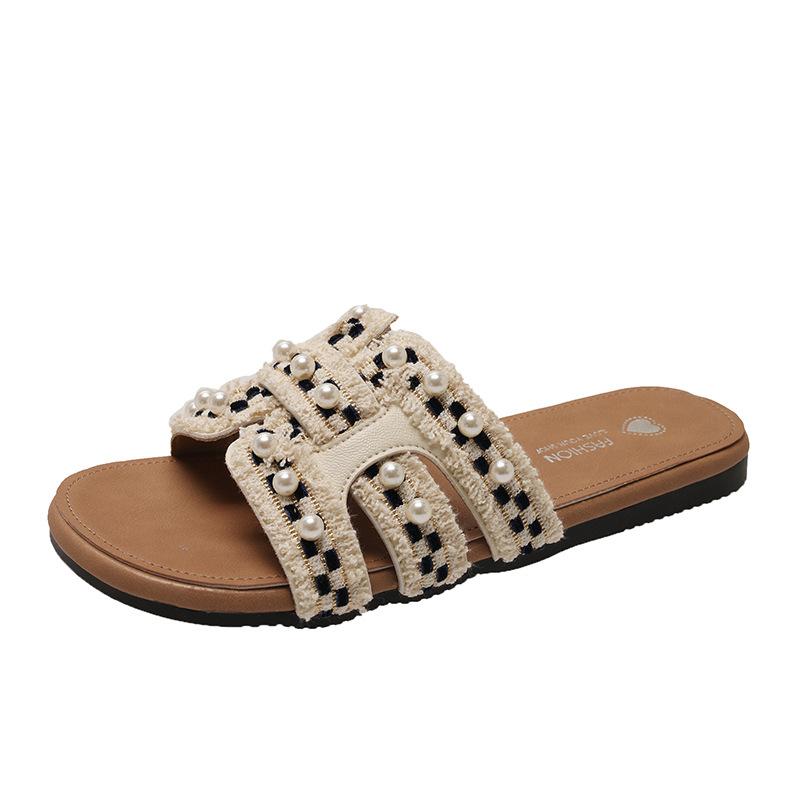 

Beautiful flat-bottomed cool slippers female summer wear 2025 new fairy style with skirt beach lazy one-word drag 35