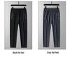 Pantaloni della tuta casual estivi da uomo in seta ghiacciata, sottili e traspiranti, con gamba dritta, tasche con cerniera e polsini.