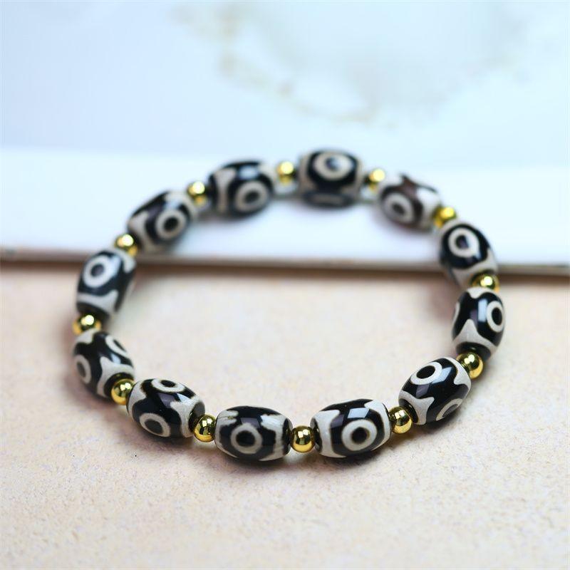 Тибетский черно-белый браслет с трехглазой бусиной Дзи - Изысканный ретро-шедевр из коллекции моды.