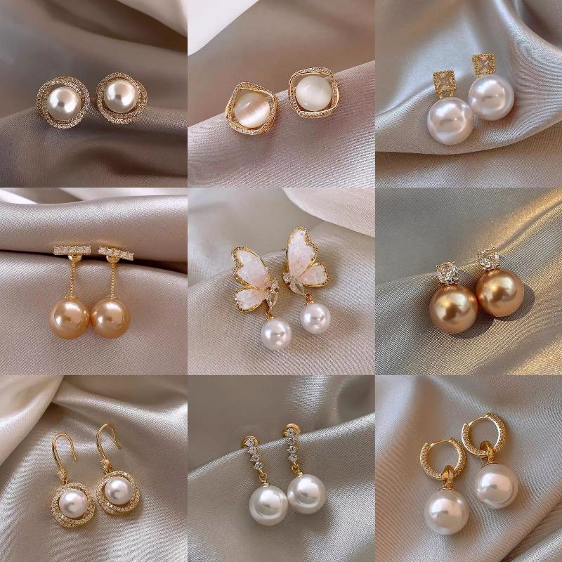 Silver needle zircon butterfly pearl earrings niche design light luxury stud earrings French high-end retro earrings wholesale