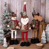 Direktlieferung ab Werk von grenzüberschreitendem weihnachtlichem Retro-Schneeflocken-Karomuster-Stoff, dehnbare Puppen für Hotels und Einkaufszentren