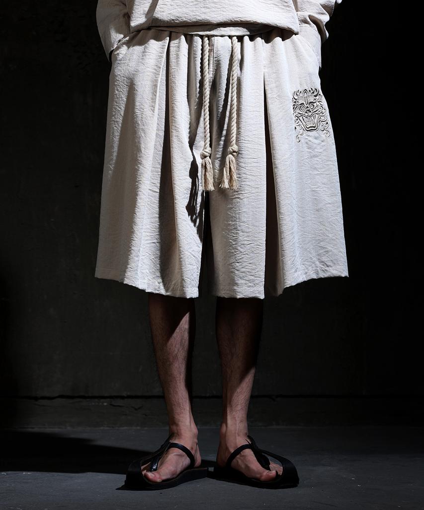 Kileutimuka Embroidered V-Tuck Shorts Beige